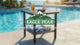 Mojave Dusk Patio Side Table/Coffee Table with Wood Grain Top and Wicker Shelf